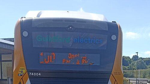 The back of an electric bus with the destination Onslow Park and Ride