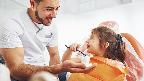 Girl in dentist chair