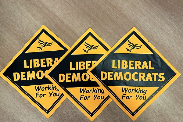 Sign up for a window poster - Guildford Liberal Democrats